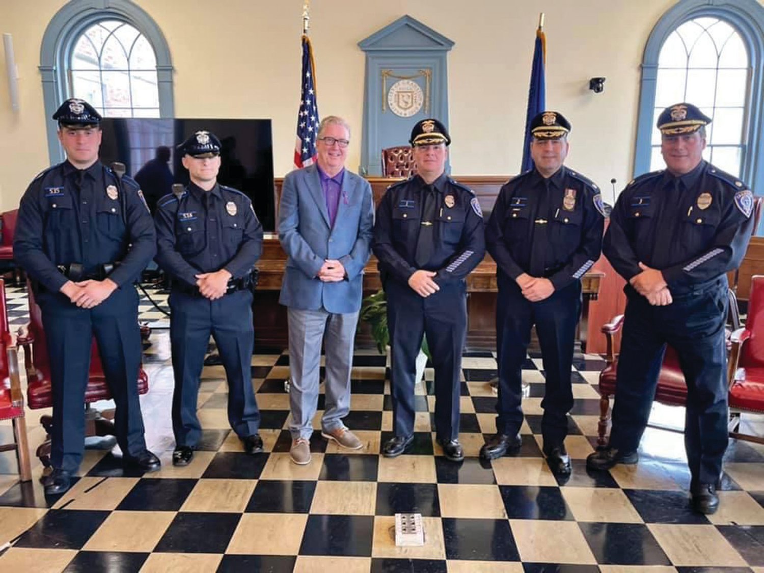 WELCOME TO CRANSTON: From left, Officer Michael Schiappa, Officer Michael Nolan, Mayor Ken Hopkins, Col. Michael Winquist, Maj. Todd Patalano and Maj. Robert Quirk gather during last week’s swearing-in ceremony at City Hall.
